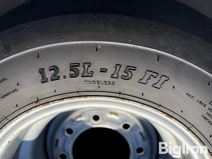 bkt-12.5l-15fi-load-range-f-tire-&-silver-8-bolt-rim-image-12