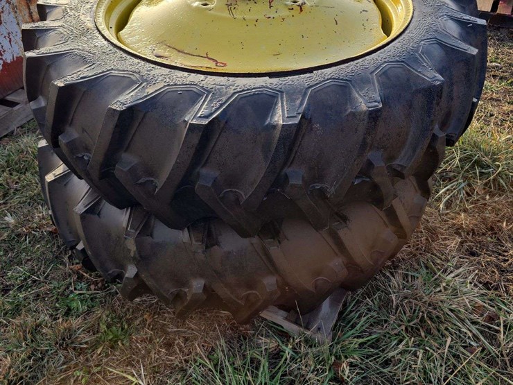 2-firestone-15.5-38-tires-on-9-bolt-rims-image-1