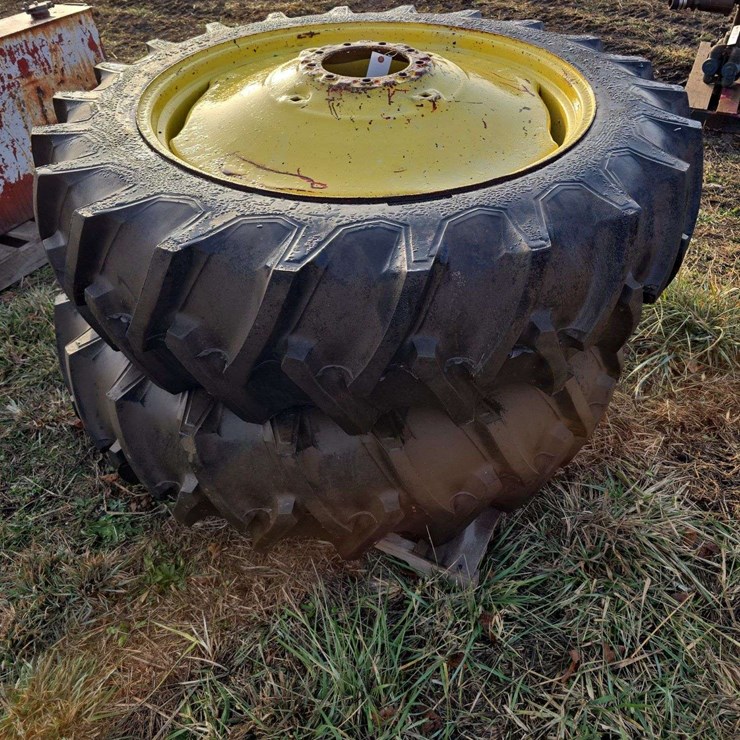 2 Firestone 15.5-38 tires on 9 bolt rims