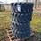 #2901-•-set/4-new-12-16.5-skid-steer-tires-image-1