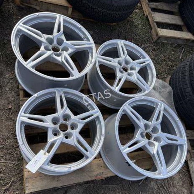 #171 • Set of 4 Corvette Rims - USED