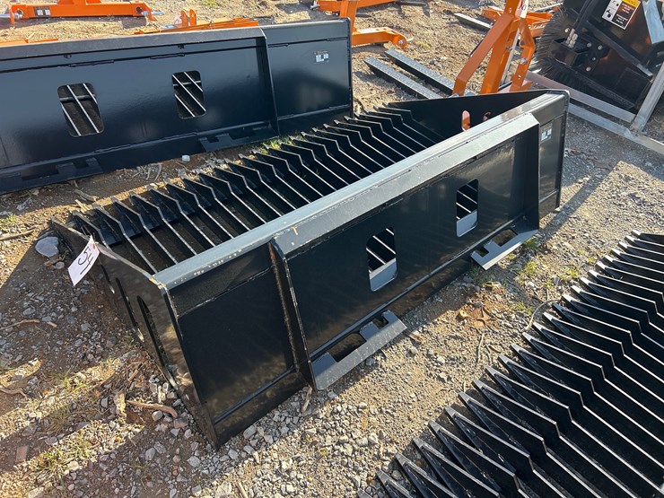 #54-•-unused-68”-skid-steer-rock-bucket-image-2