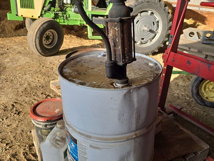 2-oil-barrels-one-with-hand-pump-image-1