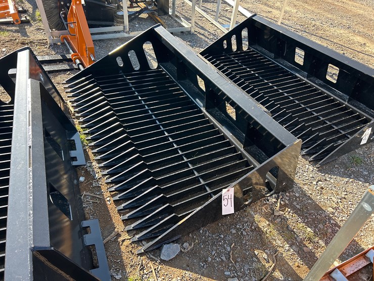 #54-•-unused-68”-skid-steer-rock-bucket-image-1