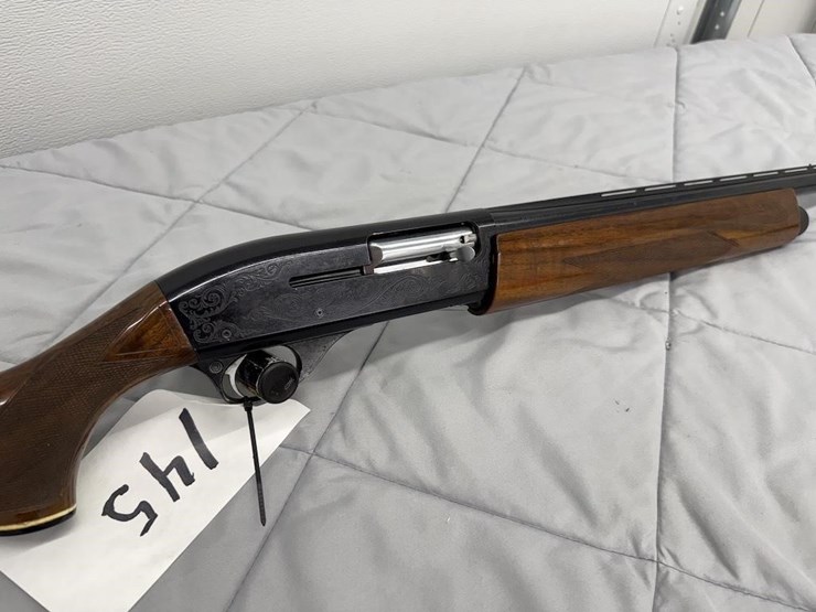smith-&-wesson-1100-12-gauge-shotgun-image-1