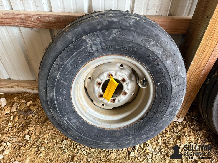 goodyear-11l-15fi-tire-on-6-bolt-rim-image-1