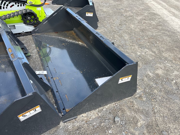 #93-•-unused-82”-skid-steer-smooth-bucket-image-1