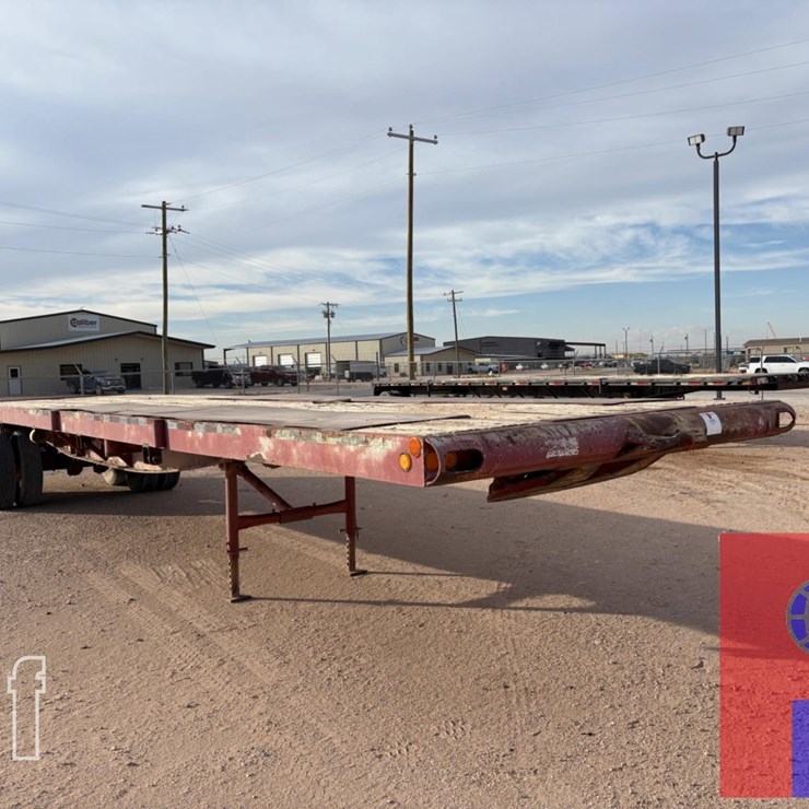 SHOPBUILT 40 X 102 T/A FLATBED TRAILER