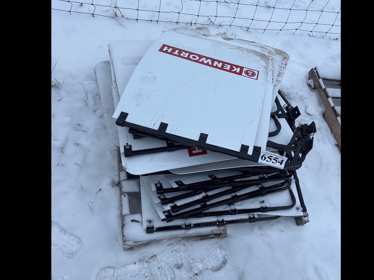 #6554-•-e1.-a-pile-of-mudflaps-image-1