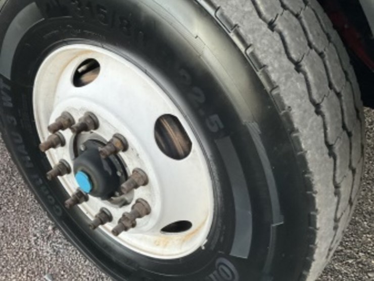 2015-peterbilt-pb348-rolloff-truck-image-11