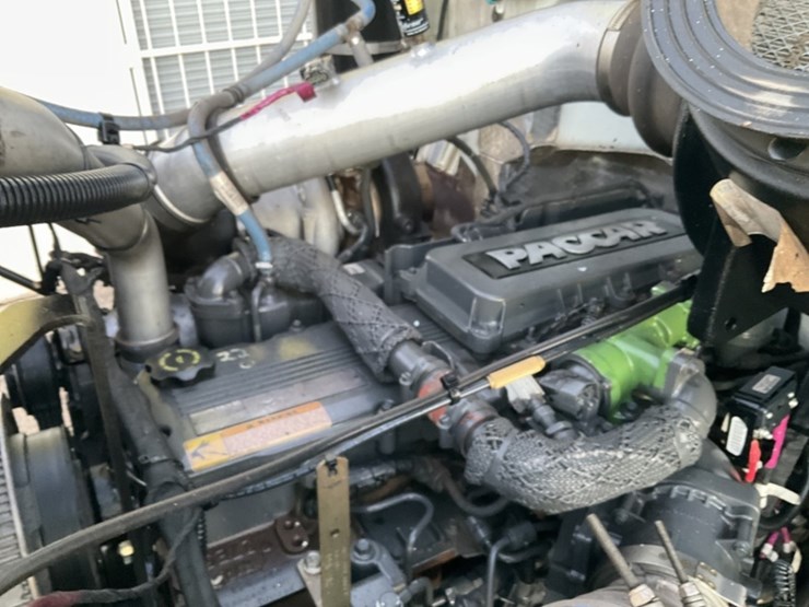 2015-peterbilt-pb348-rolloff-truck-image-18