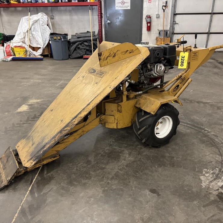 #3280 • ASE Hydraulic Tractor with Roof Remover Attachment