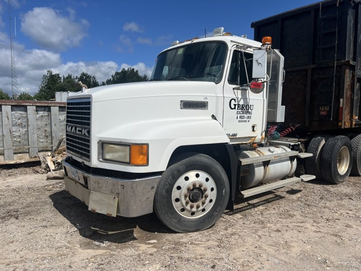 #1556-•-1999-mack-e7-460-day-cab-truck-tractor-image-1