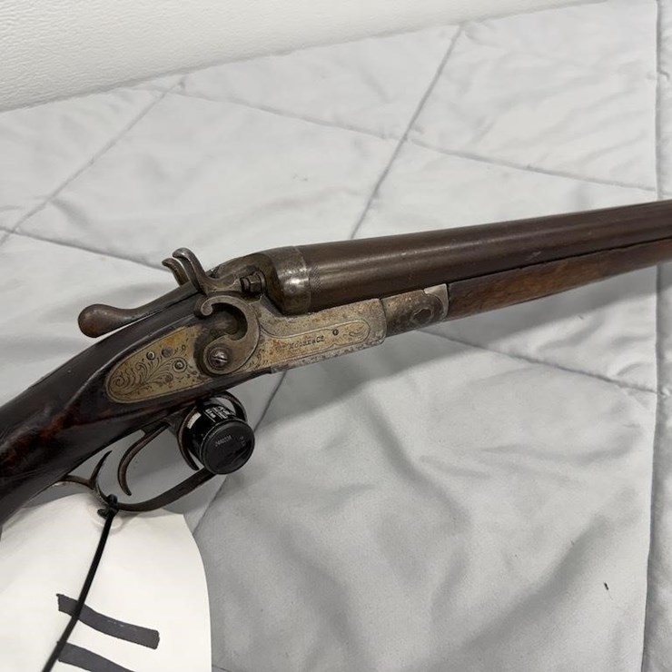 WM Moore & Co. 12 Gage Shotgun