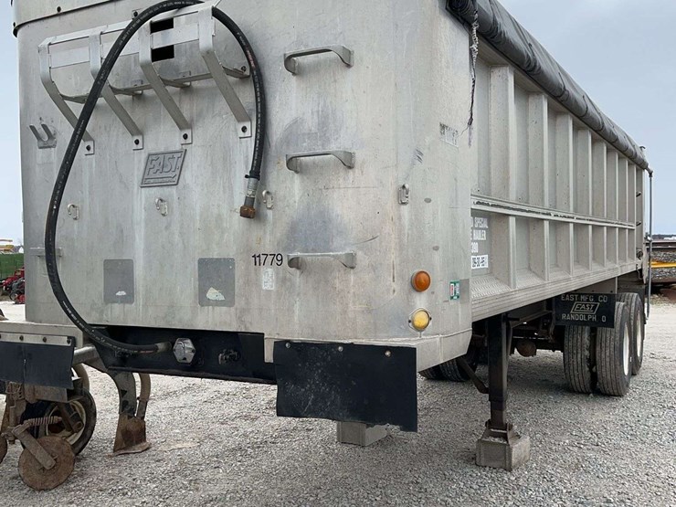 1990-east-28ft-dump-trailer,-new-hoist,-like-new-tires,-and-newer-tarp,-newer-tarp-bows,-good-liner,-really-good-shape-for-the-year,-good-shape,-just-downsizing-image-1