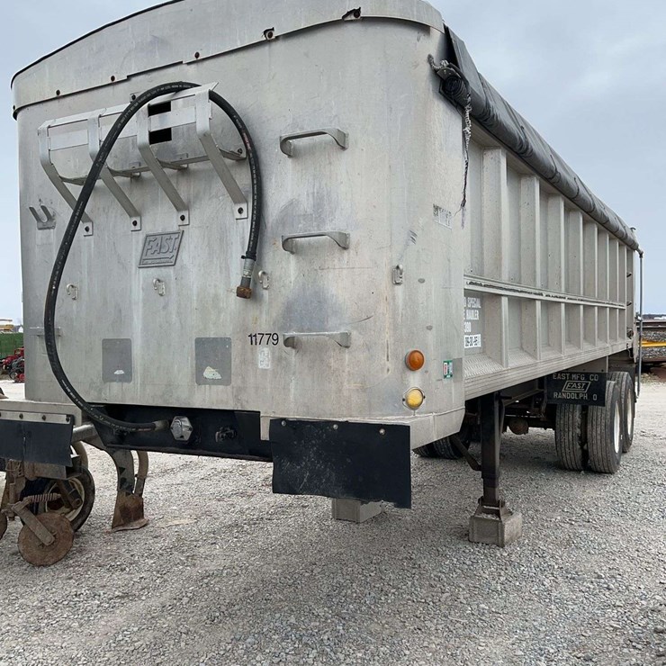 1990 East 28ft Dump Trailer, New Hoist, like new tires, and newer tarp, newer tarp bows, good liner, really good shape for the year, good shape, just downsizing