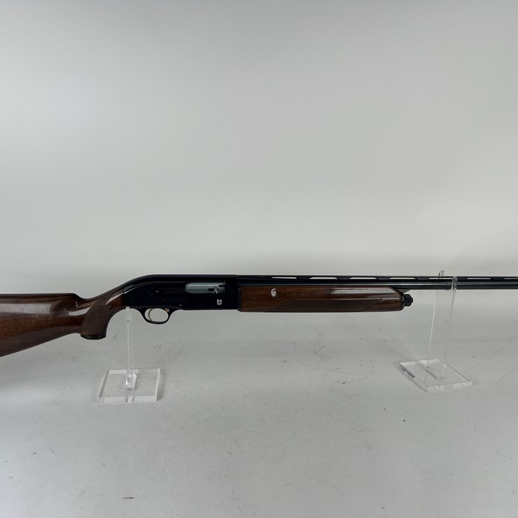 #25 • #1440 • P. Beretta Model A 301 Semi-Automatic Shotgun 12 Ga