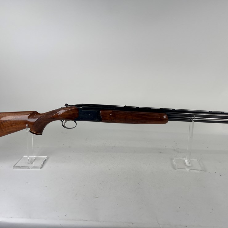 #42 • #1446 • Weatherby Olympian Over / Under Shotgun 12 Ga