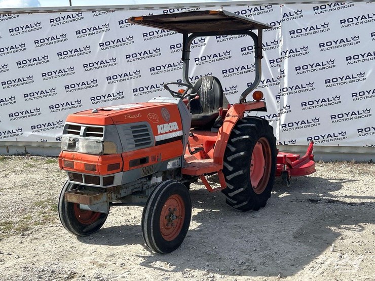 2001-kubota-l3300f-35hp-utility-tractor-with-caroni-tc710-6ft.-rotary-brush-mower-attachment-image-1