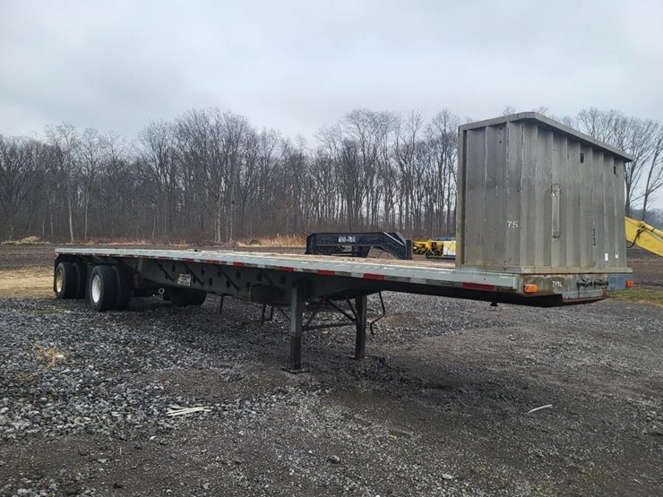 1997-transcraft-tl-2000-super-beam-spread-axle-flatbed-semi-trailer-image-1