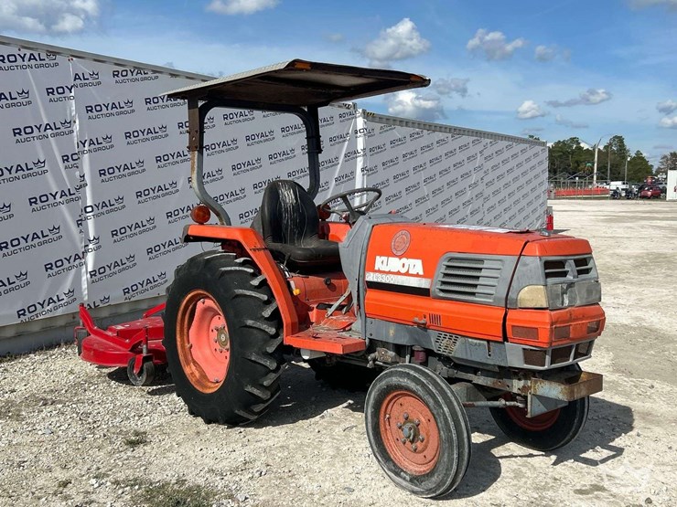 2001-kubota-l3300f-35hp-utility-tractor-with-caroni-tc710-6ft.-rotary-brush-mower-attachment-image-2
