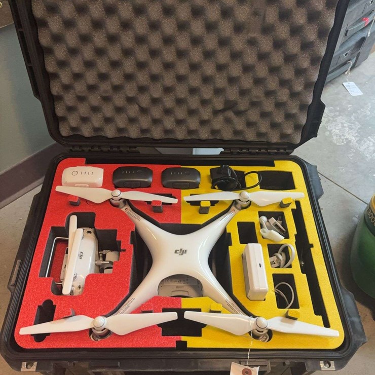 Drone DJI with charger, batteries, remote, and hard case, been used less than 5 times, few years old, very nice condition