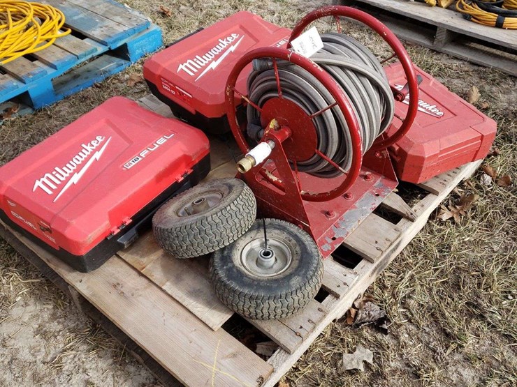 4-milwaukee-hard-cases-and-garden-hose-reel,-and-2-4.10/3.50-tires-image-2