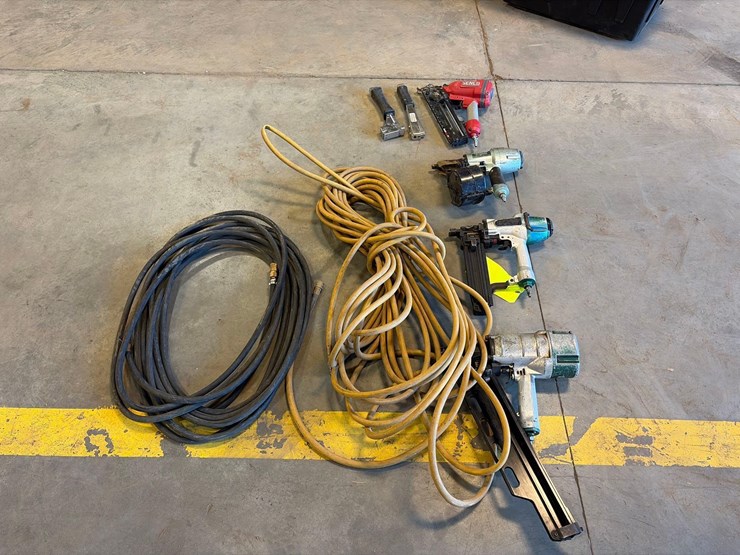 assortment-of-nail-guns,-hand-nailer,-and-hose-image-1