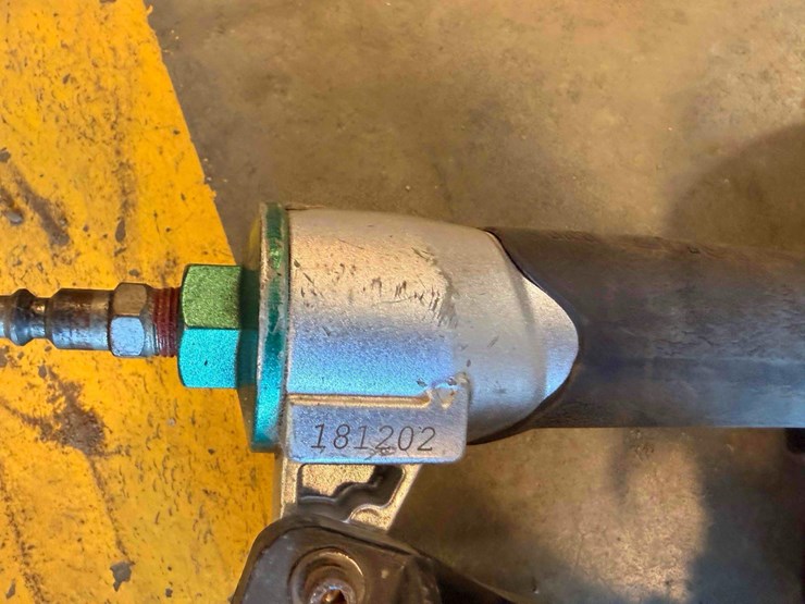 assortment-of-nail-guns-and-hose-image-13