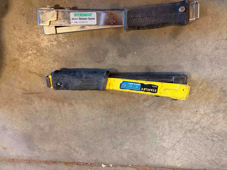 assortment-of-nail-guns-and-hose-image-18