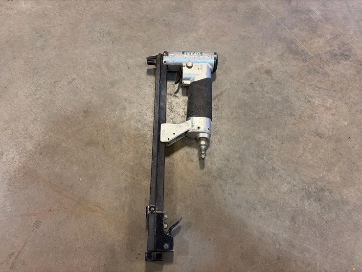 assortment-of-nail-guns-and-hoses-image-8