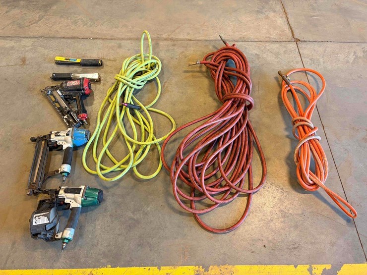 assortment-of-nail-guns-and-hose-image-1