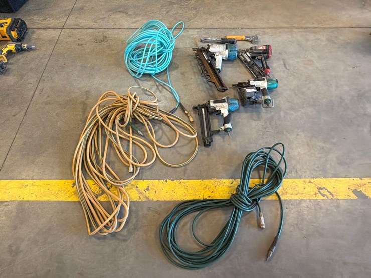 assortment-of-nail-guns,-hand-nailers,-and-hose-image-1