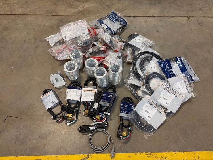 assortment-of-dryer-chords,-vent-tubes,-wash-machine-hoses,-and-range-power-cords-image-1