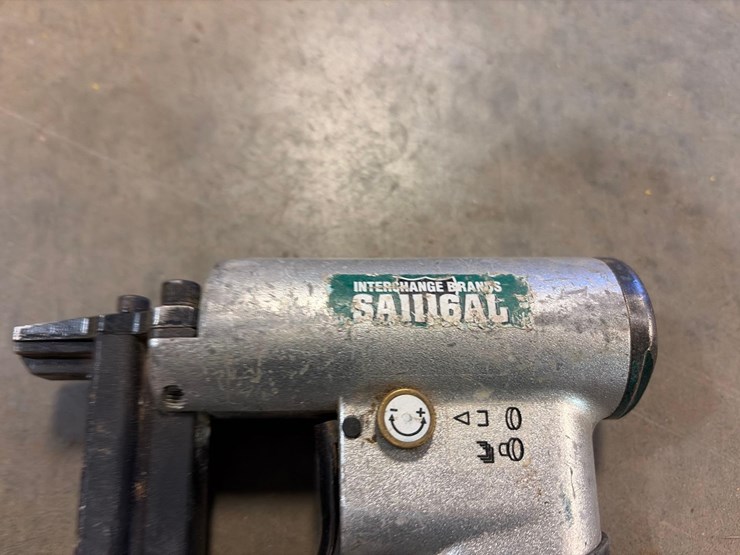 assortment-of-nail-guns-and-hoses-image-9