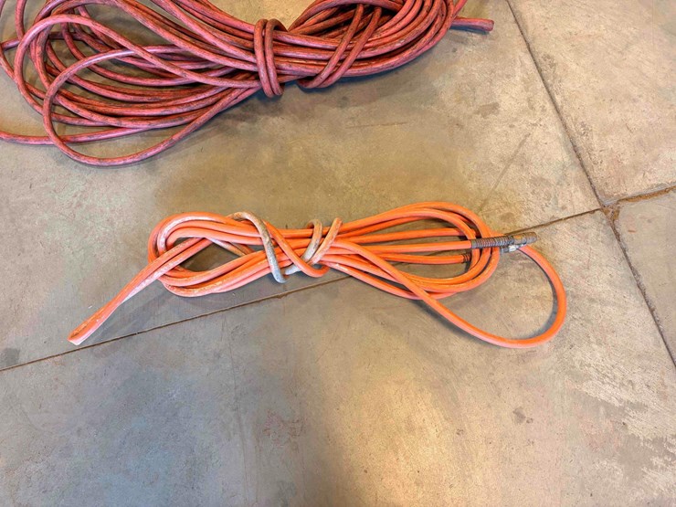 assortment-of-nail-guns-and-hose-image-16