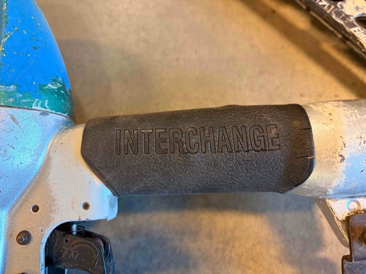 assortment-of-nail-guns-and-hose-image-11