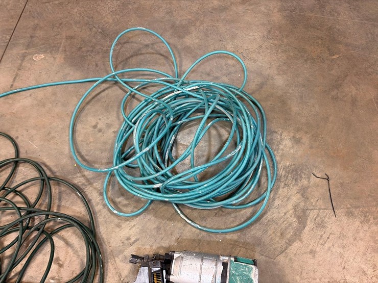 assortment-of-nail-guns-and-hoses-image-13