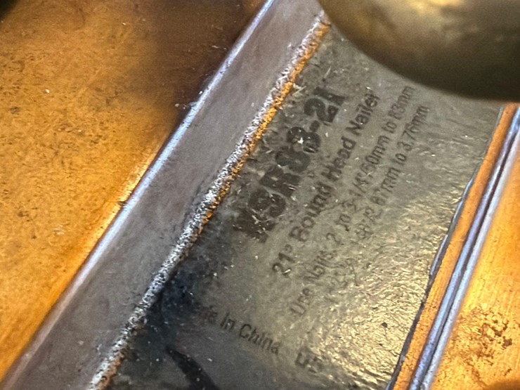 assortment-of-nail-guns,-hand-nailers,-and-hose-image-12