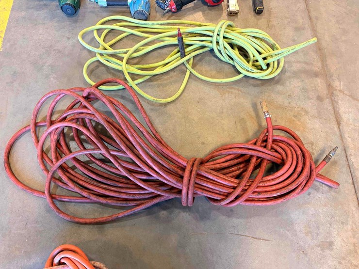 assortment-of-nail-guns-and-hose-image-15