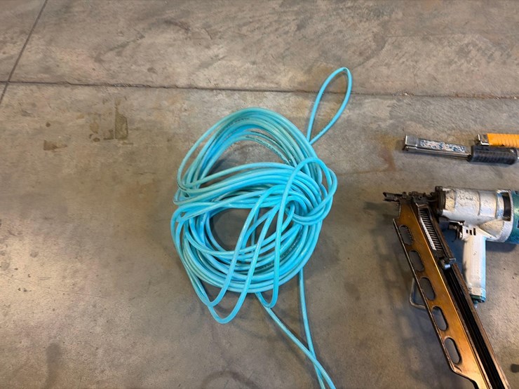 assortment-of-nail-guns,-hand-nailers,-and-hose-image-13