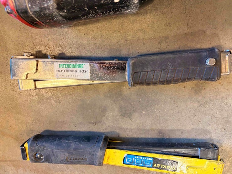 assortment-of-nail-guns-and-hose-image-17