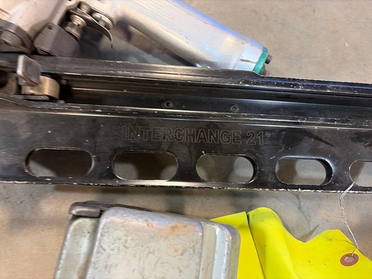 assortment-of-nail-guns-and-hoses-image-5