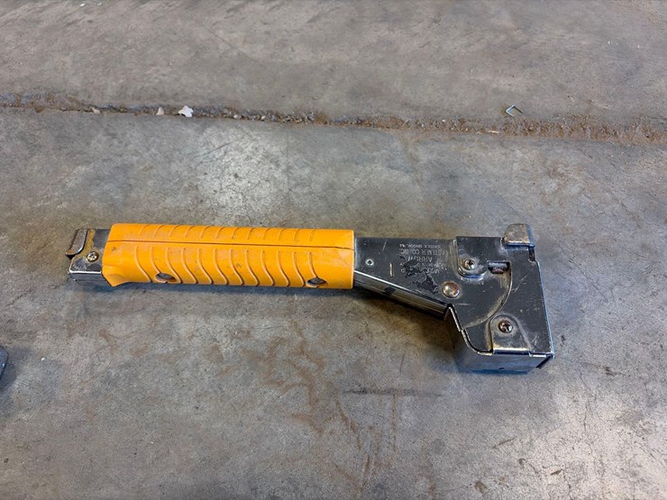 assortment-of-nail-guns,-hand-nailers,-and-hose-image-11