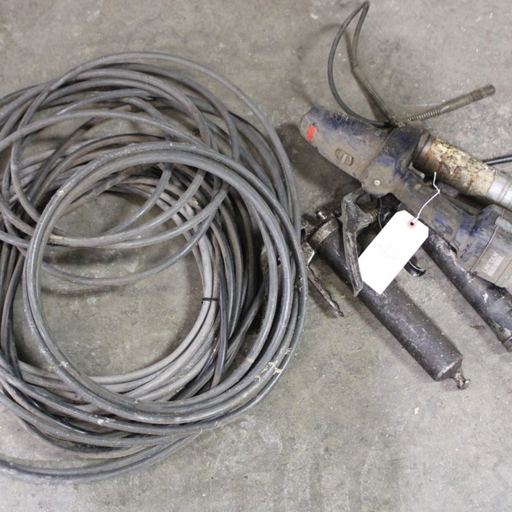Two Grease Guns With Hose