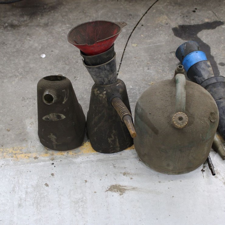 Oil Jugs And Funnels