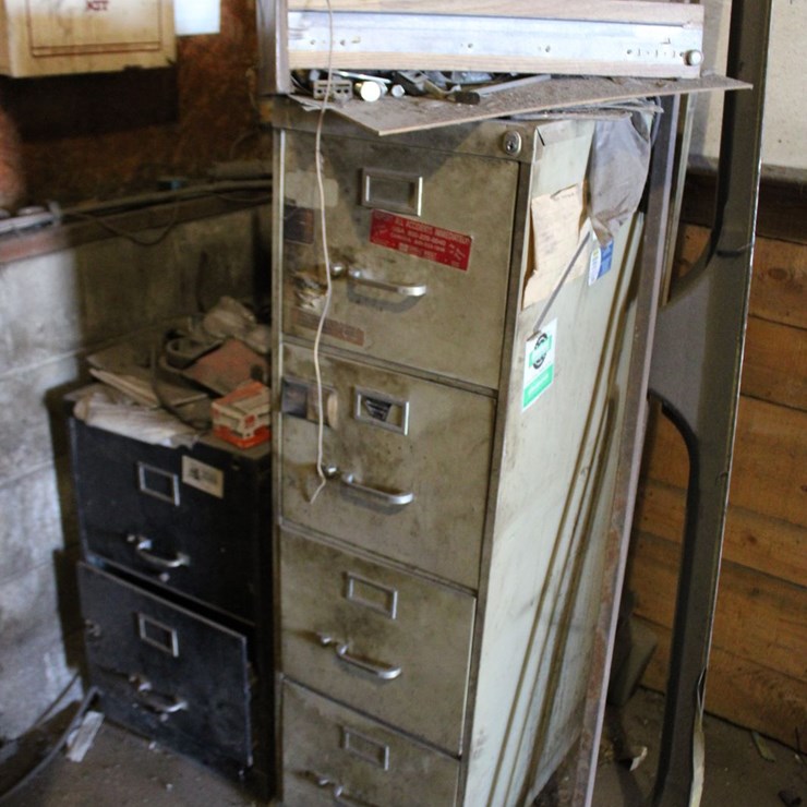 Two Filing Cabinets With Content