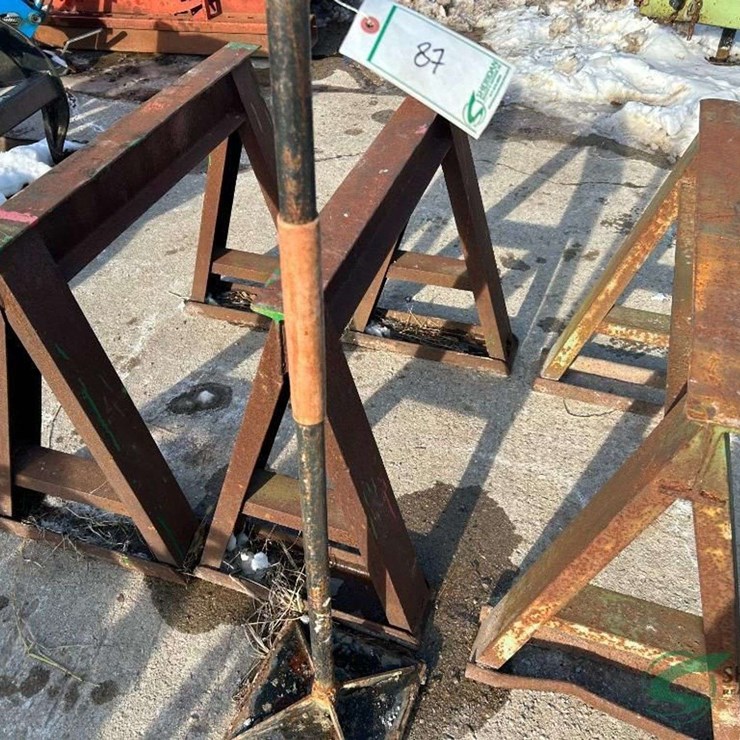 Hand Tamp and (3) Steel saw horses