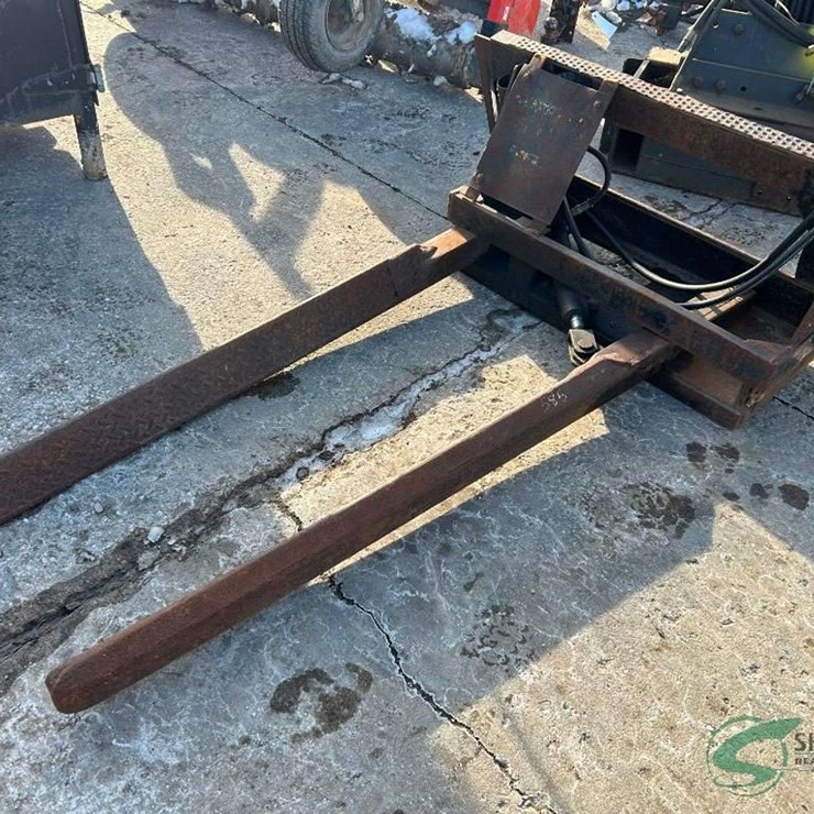 Landscape tree ball forks for skid steer