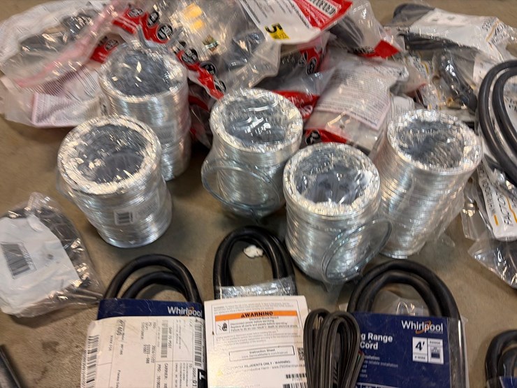 assortment-of-dryer-chords,-vent-tubes,-wash-machine-hoses,-and-range-power-cords-image-5